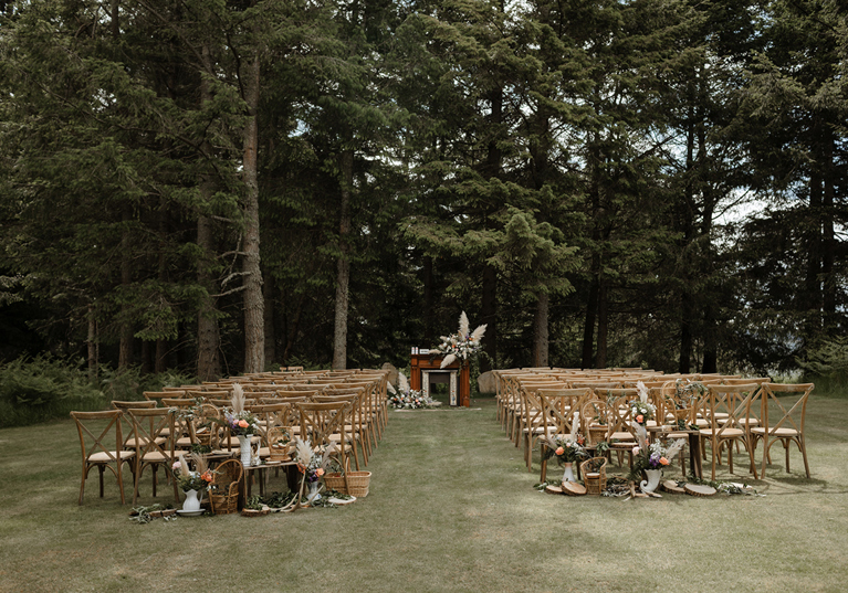 Outdoor ceremony set up with pampas grass on Cardney Estate